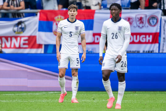 John Stones of England looks dejected