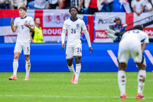 John Stones and Kobbie Mainoo of England look dejected