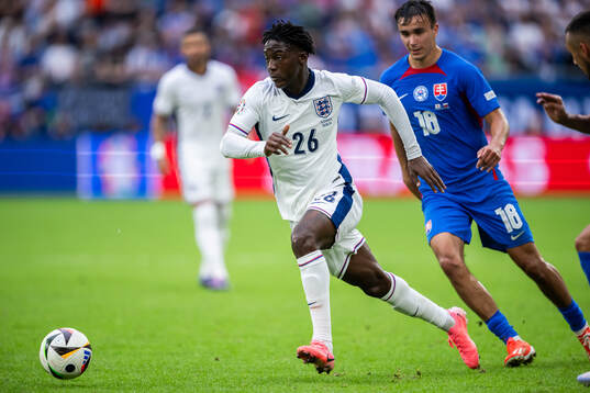 Kobbie Mainoo of England and David Strelec of Slovakia