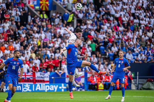 Milan Skriniar of Slovakia and Declan Rice of England