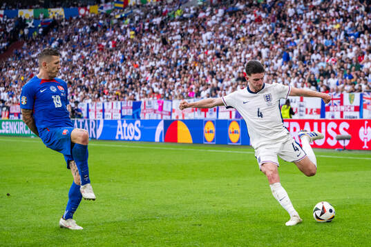 Juraj Kucka of Slovakia and Declan Rice of England