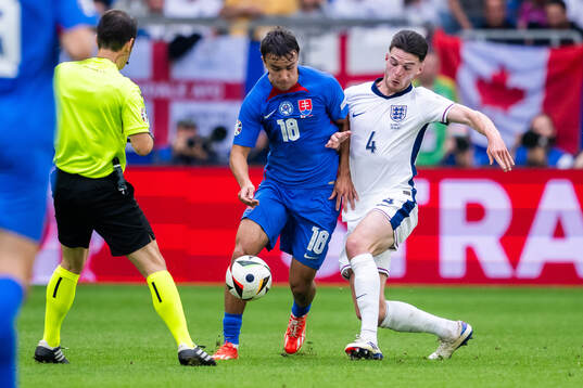 David Strelec of Slovakia and Declan Rice of England