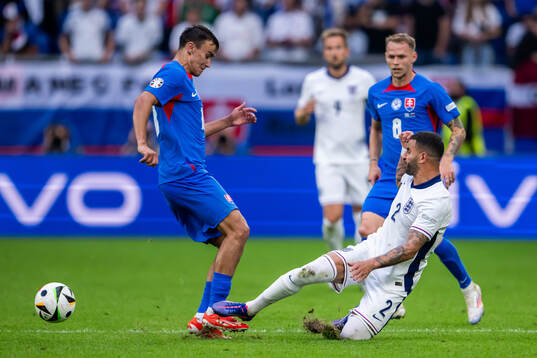 David Strelec of Slovakia and Kyle Walker of England