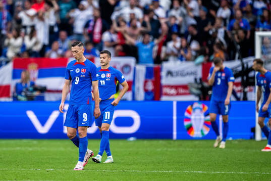 Robert Bozenik and Laszlo Benes of Slovakia look dejected