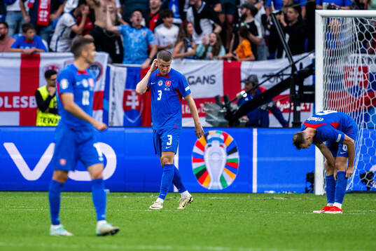 Denis Vavro of Slovakia looks dejected