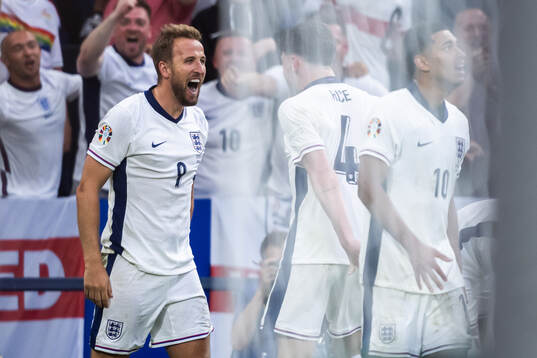 Harry Kane of England celebrates