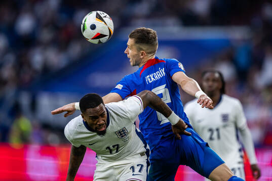 Ivan Toney of England and Peter Pekarik of Slovakia