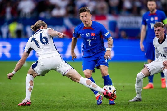 Conor Gallagher and Cole Palmer of England and Tomas Suslov