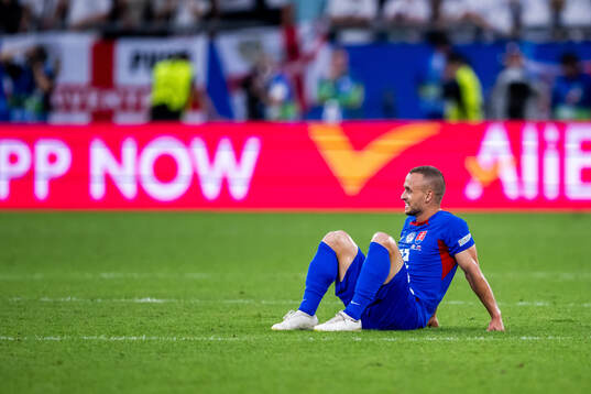 Stanislav Lobotka of Slovakia looks dejected