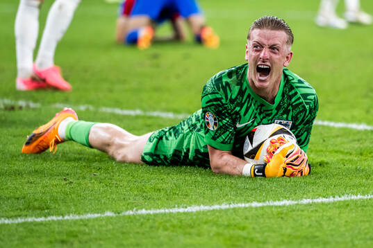 Goalkeeper Jordan Pickford of England celebrates