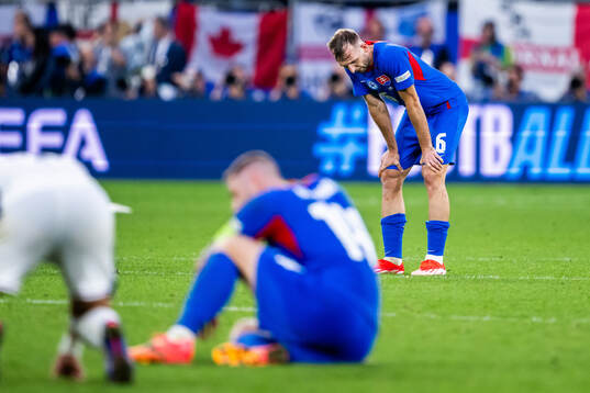 Norbert Gyömber of Slovakia looks dejected