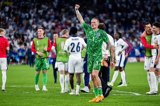 Goalkeeper Jordan Pickford of England celebrates