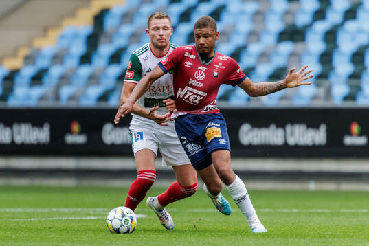 Örgrytes Mikael Dyrestam och Skövde AIKs Stefan Ljubicic