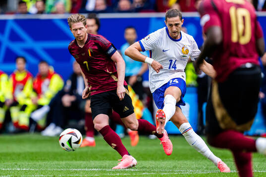 Kevin De Bruyne of Belgium and Adrien Rabiot of France