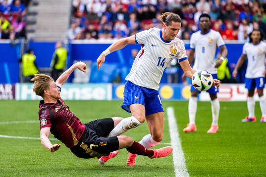 Kevin De Bruyne of Belgium and Adrien Rabiot of France