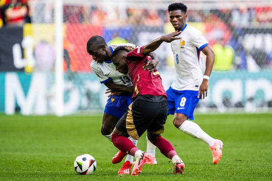 N'Golo Kanté of France and Jeremy Doku of Belgium