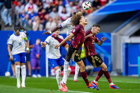 Wout Faes and Timothy Castagne of Belgium and Marcus Thuram