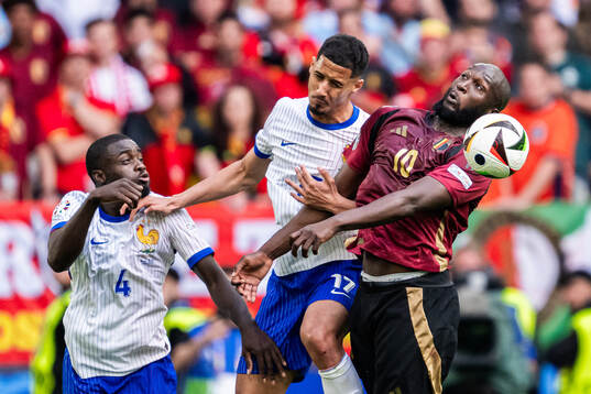 Dayot Upamecano and William Saliba of France and Romelu