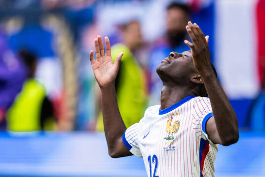 Randal Kolo Muani of France celebrates