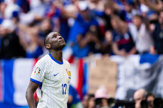 Randal Kolo Muani of France celebrates