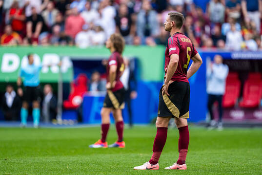 Jan Vertonghen of Belgium looks dejected