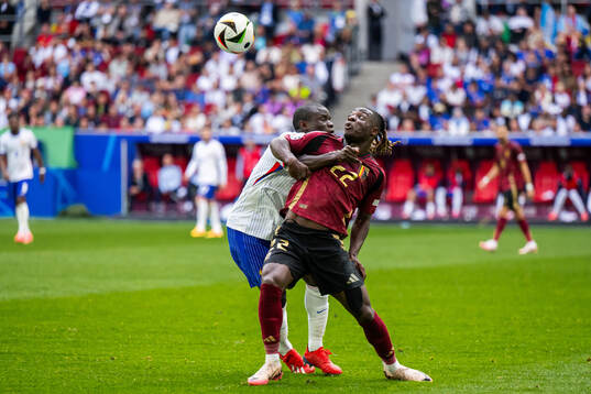 N'Golo Kanté of France and Jeremy Doku of Belgium