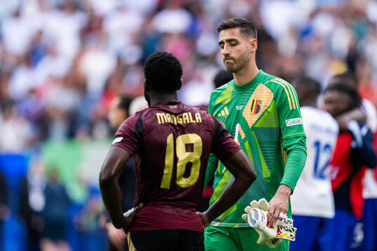 Goalkeeper Koen Casteels of Belgium looks dejected
