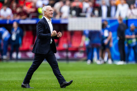 Head coach Didier Deshamps of France celebrates