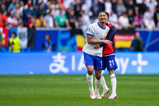 William Saliba and Jonathan Clauss of France celebrate