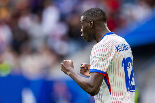 Randal Kolo Muani of France celebrates
