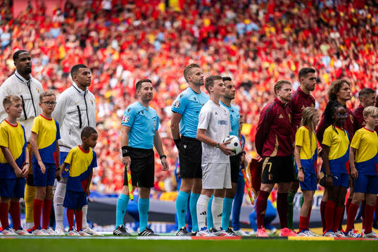 Referee Glenn Nyberg and assistant referees Andreas