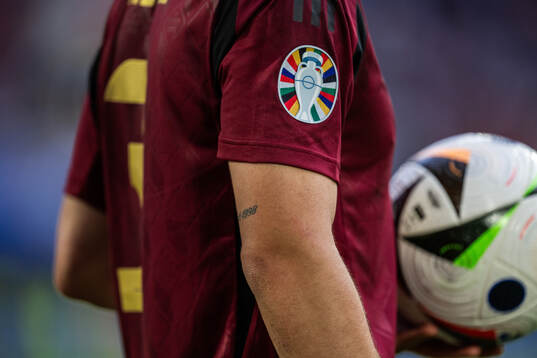 The logo for the tournament is seen