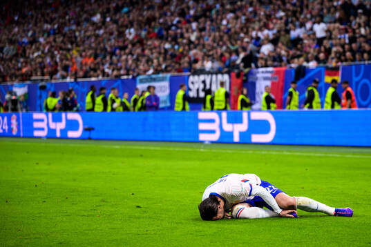 Theo Hernandez of France in pain