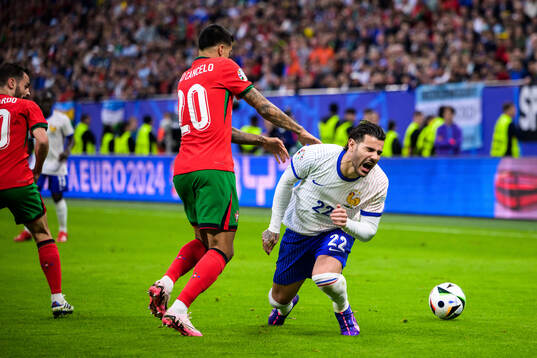 Joao Cancelo of Portugal and Theo Hernandez of France