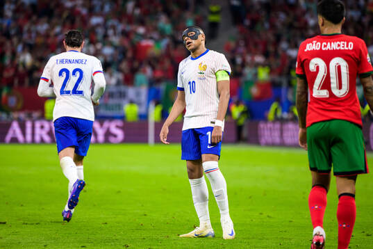 Kylian Mbappé of France looks dejected