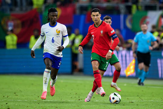 Eduardo Camavinga of France and Cristiano Ronaldo of