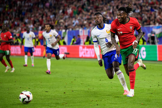 Eduardo Camavinga of France and Rafael Leao of Portugal