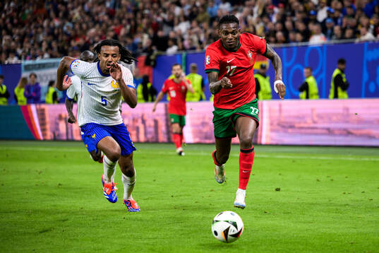 Jules Koundé of France and Goncalo Inacio of Portugal
