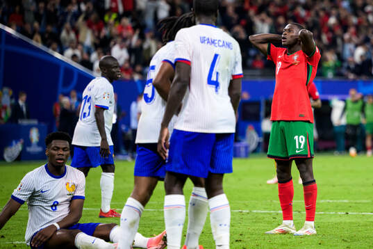 Nuno Mendes of Portugal looks dejected