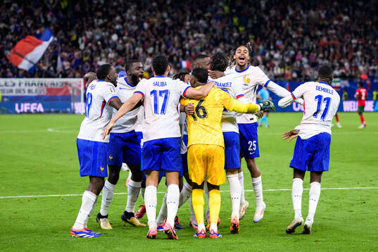 Players of France celebrate