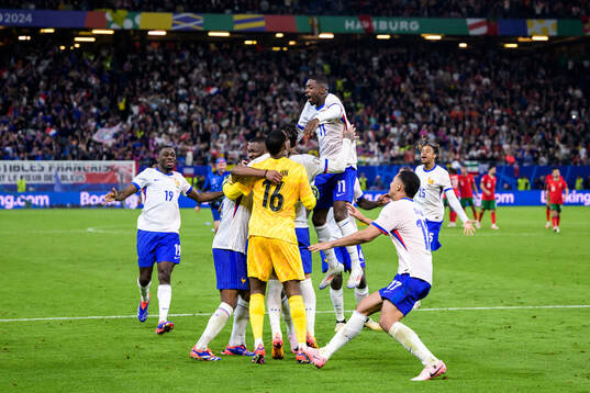 Players of France celebrate