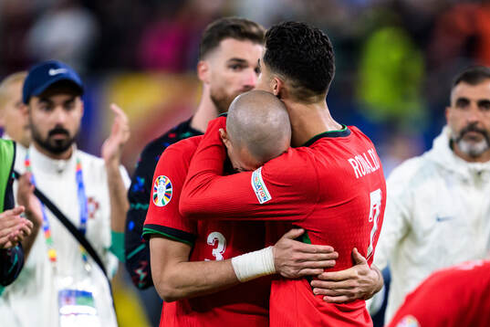 Pepe and Cristiano Ronaldo of Portugal looks dejected
