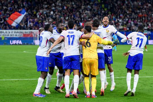 Bradley Barcola of France celebrates