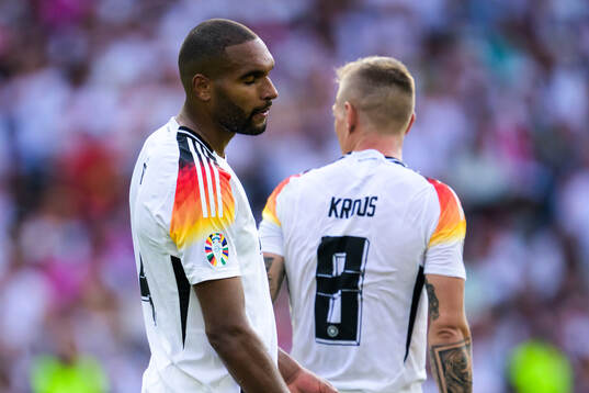 Jonathan Tah of Germany looks dejected