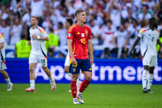 Daniel Olmo of Spain looks dejected