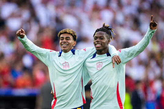 Lamine Yamal and Nicholas Williams of Spain celebrate