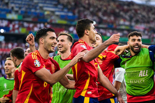 Mikel Merino and Rodrigo Hernandez of Spain celebrate