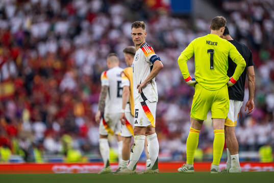 Joshua Kimmich of Germany looks dejected