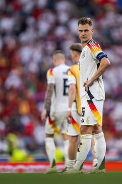 Joshua Kimmich of Germany looks dejected