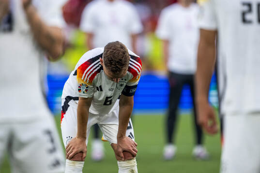 Joshua Kimmich of Germany looks dejected